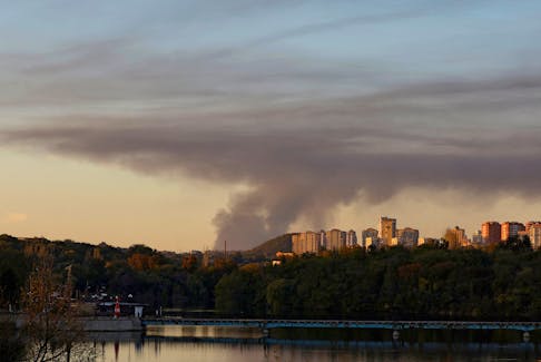 FILE PHOTO: Smoke rises from the area in the direction of Avdiivka in the course of Russia-Ukraine conflict, as seen from Donetsk, Russian-controlled Ukraine, October 11, 2023. REUTERS/Alexander Ermochenko/File Photo