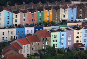 FILE PHOTO: Painted rows of houses are seen in Bristol, Britain, August 11, 2023. REUTERS/Toby Melville/File Photo