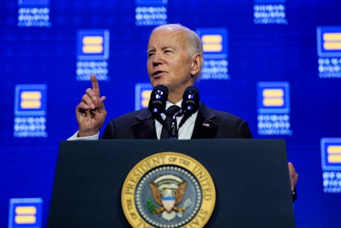 U.S. President Joe Biden speaks at a dinner hosted by the Human Rights Campaign at the Washington Convention Center in Washington, U.S., October 14, 2023. REUTERS/Ken Cedeno
