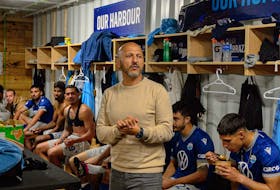 HFX Wanderers head coach Patrice Gheisar addresses his club after they clinched a Canadian Premier League playoff spot following a home victory over Forge FC on Sept. 30 in Halifax. - Trevor MacMillan / Canadian Premier League
