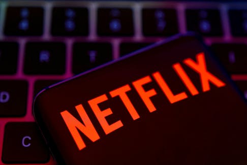 FILE PHOTO: Smartphone with Netflix logo is placed on a keyboard in this illustration taken April 19, 2022. REUTERS/Dado Ruvic/File Photo
