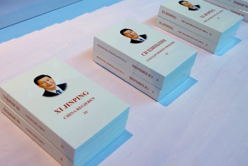 Copies of "Xi Jinping: The Governance of China" in Russian are displayed outside the media center ahead of the Third Belt and Road Forum in Beijing, China October 16, 2023. REUTERS/Edgar Su