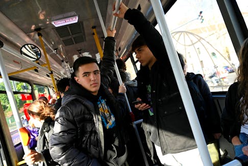 Tomas Kremenchuzky, 17, rides the bus home after school, in Buenos Aires, Argentina August 8, 2023. REUTERS/Magali Druscovich