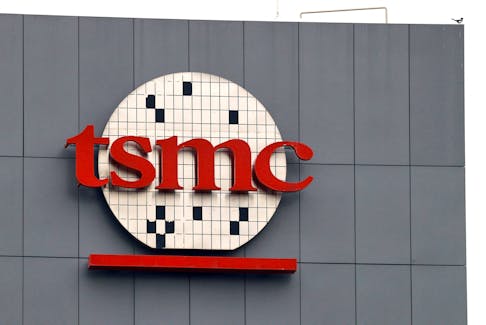 FILE PHOTO: A logo of Taiwanse chip giant TSMC can be seen in Tainan, Taiwan December 29, 2022. REUTERS/Ann Wang/File Photo