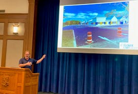 The Flower Cart Group chief executive officer Jeff Kelly explains details of the new facility being finished in New Minas during a recent speech at Acadia University. It should open late next month.
WENDY ELLIOTT