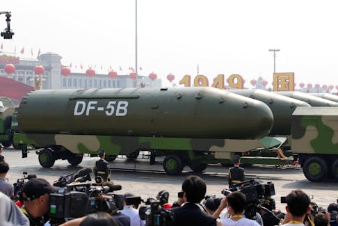 Military vehicles carrying DF-5B intercontinental ballistic missiles travel past Tiananmen Square during the military parade marking the 70th founding anniversary of People's Republic of China, on its National Day in Beijing, China October 1, 2019.