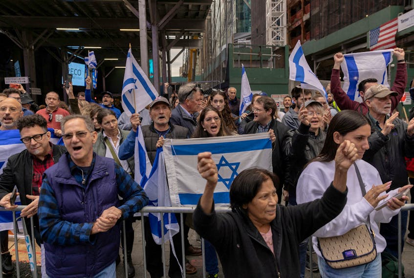 Pro-Israel demonstrators protest in Times Square on the second day of the ongoing conflict between Israel and the Palestinian militant group Hamas, in Manhattan in New York City, U.S., October 8, 2023.