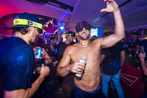 George Springer of the Toronto Blue Jays celebrates their playoff berth in the locker-room after the final MLB game of the regular season against the Tampa Bay Rays at the Rogers Centre on Sunday Oct. 1, 2023, in Toronto.