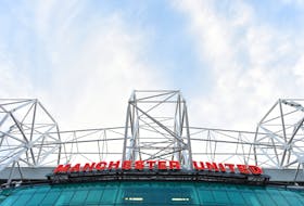 (Reuters) -British billionaire Jim Ratcliffe's INEOS Sports is contemplating buying a minority stake in Manchester United rather than seeking full control, in an effort to end a nearly ten month-long