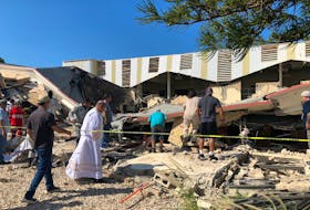 MONTERREY, Mexico (Reuters) - The death toll caused by the collapse of a church roof during a Sunday Mass in northern Mexico has risen to 10, and another 60 people were injured, officials said on