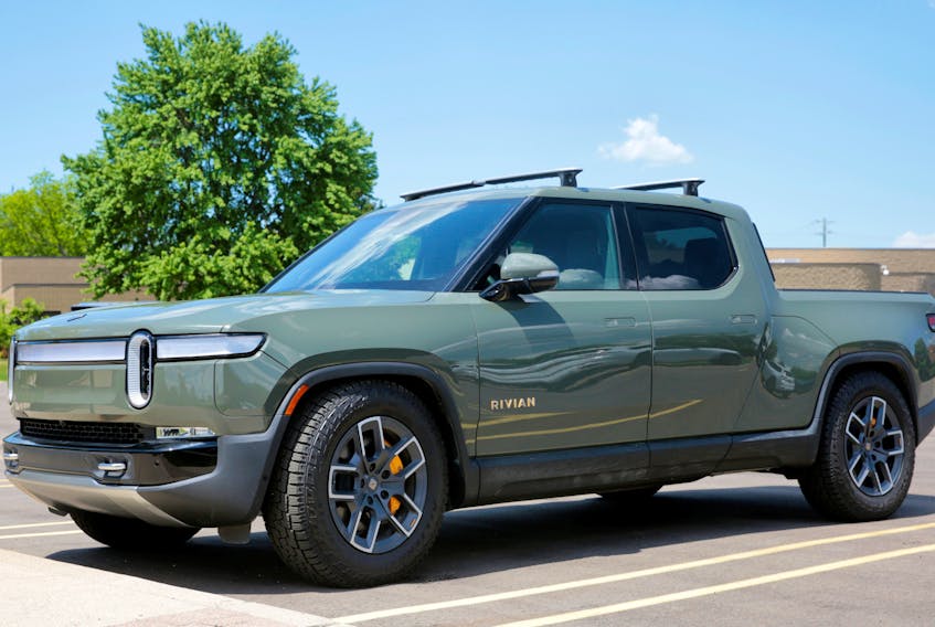 SAN FRANCISCO (Reuters) - Electric-vehicle maker Rivian Automotive on Monday reported third-quarter deliveries above analysts' estimates, as it ramped up production to meet a sustained demand for its