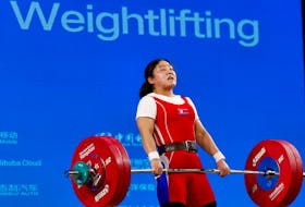 By Martin Quin Pollard HANGZHOU, China (Reuters) -North Korea's weightlifters once again crushed the opposition at the Hangzhou Asian Games on Monday with another world record and two more golds,