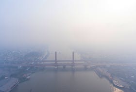 JAKARTA (Reuters) - Indonesia's environment ministry on Monday denied accusations that forest fires in Sumatra and its portion of Borneo island, which have blanketed some of its cities with thick haze