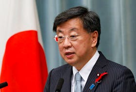 TOKYO (Reuters) - Japan's Chief Cabinet Secretary Hirokazu Matsuno said on Monday the government would continue to monitor currency moves with "a high sense of urgency". He also repeated that it is