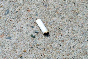 A cigarette butt is seen on a downtown Sydney sidewalk. The Sydney Downtown Development Association recently purchased 22 cigarette butt receptacles that will be mounted outside bars, restaurants, bus stops and other locations. Chris Connors/Cape Breton Post