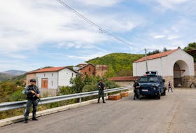 BELGRADE (Reuters) - Serbia has withdrawn some troops stationed near the border with Kosovo, after having increased the numbers deployed there following a gun battle in northern Kosovo in which four