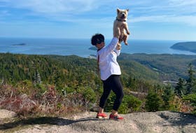 Emilie Chiasson and Millie thoroughly enjoyed their visit to Cape Breton, which included a hike up Franey Mountain. - Emilie Chiasson