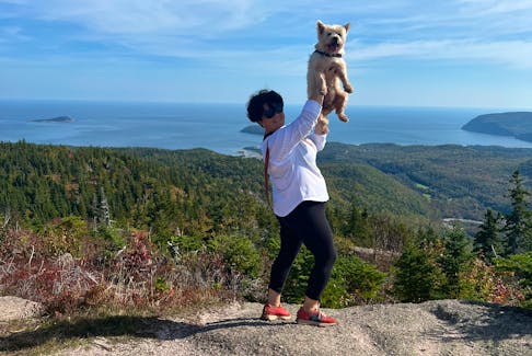 Emilie Chiasson and Millie thoroughly enjoyed their visit to Cape Breton, which included a hike up Franey Mountain. - Emilie Chiasson