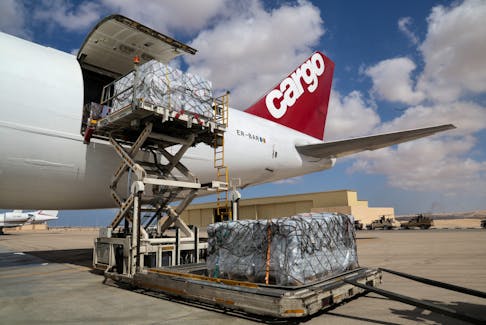 A view of humanitarian aid for Palestinians next to a plane, as officials wait to deliver aid to Gaza through the Rafah border crossing between Egypt and the Gaza Strip, amid the ongoing conflict between Israel and the Palestinian Islamist group Hamas, at Al Arish airport, Egypt October 20, 2023.