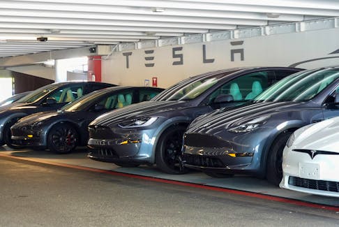 Tesla vehicles are shown near one of the company’s retail stores in San Diego, California, U.S.,October 20, 2023.