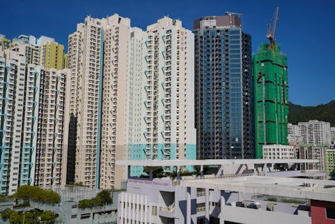 A residential development, in which Evergrande, according to sources, has transferred unsold units to its joint-venture partner VMS Group, is pictured among other buildings in Hong Kong, China, November 27, 2021.