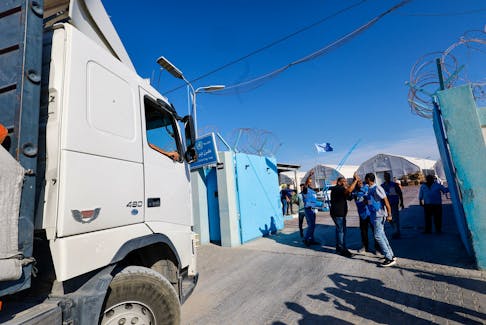 An aid truck arrives at a UN storage facility as the conflict between Israel and Palestinian Islamist group Hamas continues, in the central Gaza Strip October 21, 2023.
