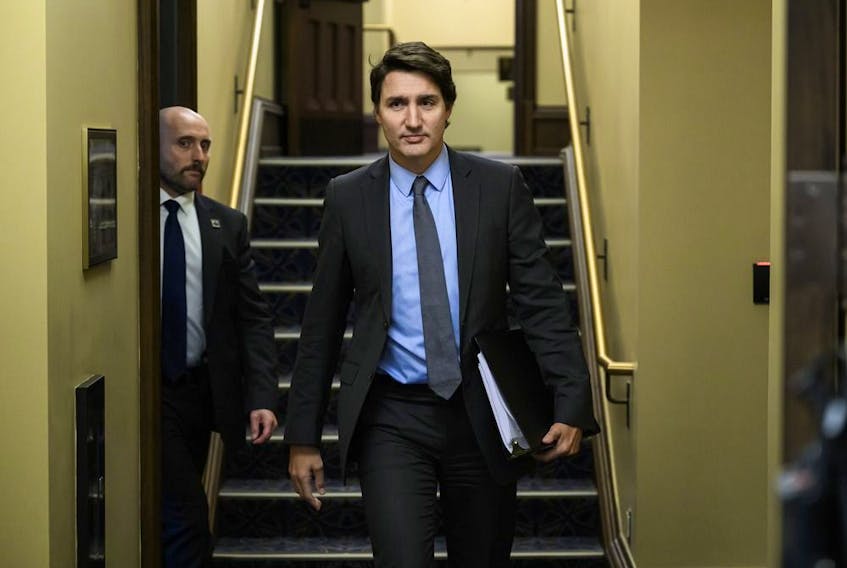Prime Minister Justin Trudeau, seen arriving for Tuesday's Question Period, says Canada supports the idea of "humanitarian pauses" in the Israel-Hamas conflict to allow for necessary aid to be delivered into Gaza.