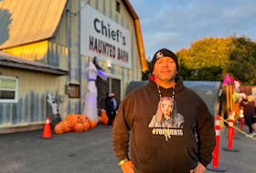 Chief Junior Gould from Abegweit First Nation stands in front of the Chief's Haunted Barn – a Halloween community initiative that he and fellow community members put together every year to gather food donations for local food banks. Thinh Nguyen • The Guardian