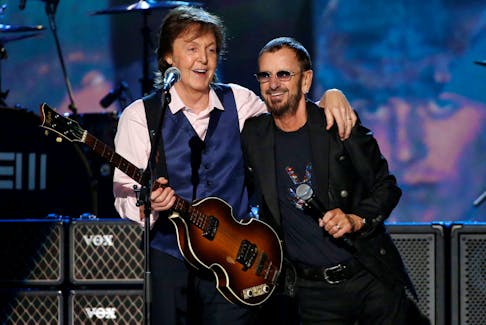 Paul McCartney (L) and Ringo Starr perform during the taping of "The Night That Changed America: A GRAMMY Salute To The Beatles", which commemorates the 50th anniversary of The Beatles appearance on the Ed Sullivan Show, in Los Angeles January 27, 2014.  