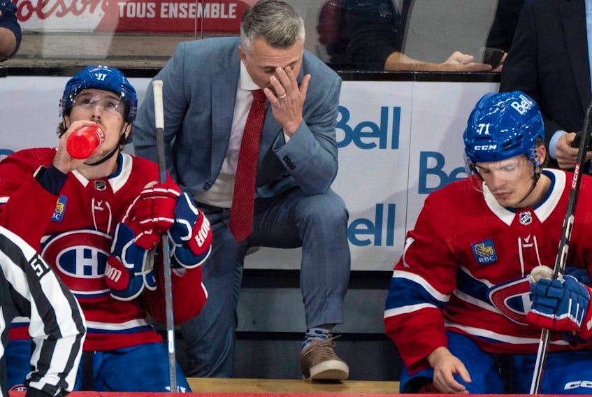 Canadiens head coach Martin St. Louis reacts behind the bench during second period NHL action against the Minnesota Wild in Montreal on Oct. 17, 2023. Down 2-0 after the first period against the Blue Jackets on Oct. 26, 2023, St. Louis addressed his players in the locker room during intermission. "He came in the room after the first and said what he had to say and got us going," Cole Caufield said after the game, which Montreal won 4-3 in overtime on a goal by Caulfield. "I think it got the room some life."