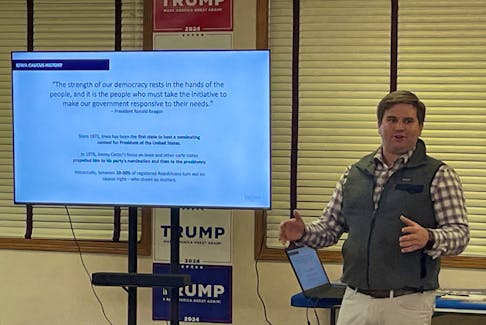 Marshall Moreau, state director for Donald Trump's 2024 Iowa campaign, gives a training presentation for precinct captains at the campaign's headquarters, in Urbandale, Iowa, U.S., October 15, 2023.