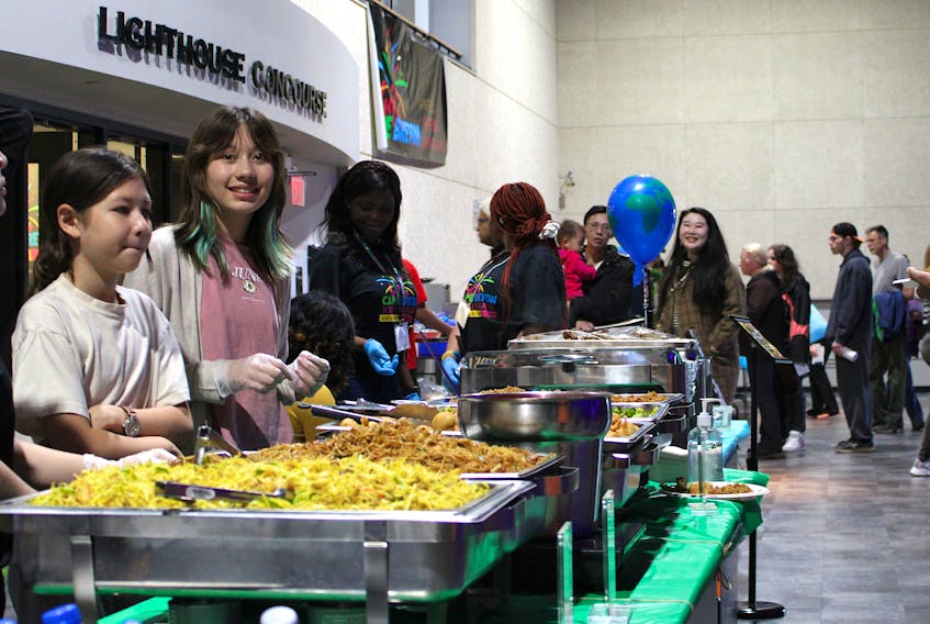A look at one of the food vendor booths at the Hello Cape Breton (Kwe' Unama'ki) cultural festival, held at the Joan Harris Cruise Pavillion in Sydney on Saturday. The event invited Cape Bretoners originally from other countries to cook food or set up booths with information about their home countries. LUKE DYMENT/CAPE BRETON POST
