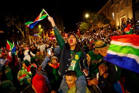 Rugby Union - Rugby World Cup 2023 - Final - South Africa fans watch New Zealand v South Africa - Cape Town, South Africa - October 28, 2023 Fans celebrate in Cape Town after South Africa win the world cup final