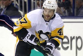 Pittsburgh Penguins forward Adam Johnson in action during an NHL hockey game in Columbus, Ohio, Friday, Sept. 22, 2017.