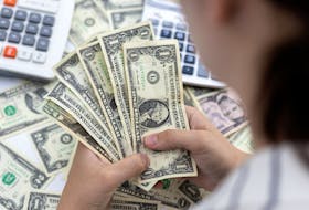 By Brigid Riley TOKYO (Reuters) - The dollar held on to fresh highs on Tuesday, pushing the yen down closer to an intervention zone, after strong U.S. economic data bolstered the view that the Federal