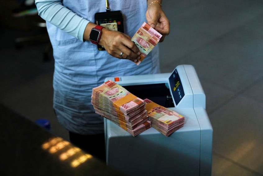 By Stefanno Sulaiman and Gayatri Suroyo JAKARTA (Reuters) - Indonesia's central bank has intervened in the foreign exchange market to manage the supply and demand of U.S. dollars amid market