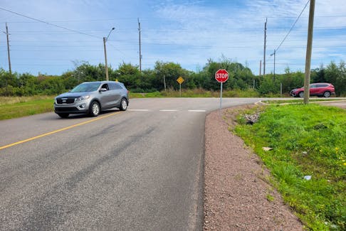 A vehicle turns onto Spencer Drive in Charlottetown, which the city proposes to extend. A proposed housing development on Mount Edward Road would run along one side of the extension. Logan MacLean • The Guardian