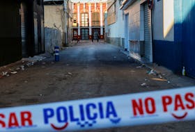 MADRID (Reuters) - A court in Spain's southeastern region of Murcia has opened a criminal investigation into suspected reckless manslaughter in the deaths of 13 people in the country's deadliest