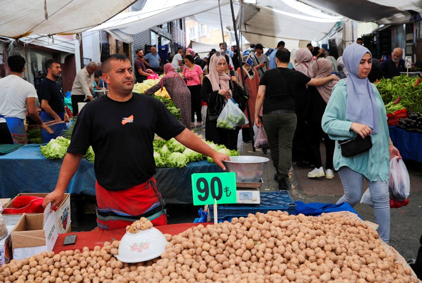 ISTANBUL (Reuters) - Turkish annual consumer price inflation climbed to 61.53% in September, official data showed on Tuesday, just below expectations and rising for a third consecutive month in