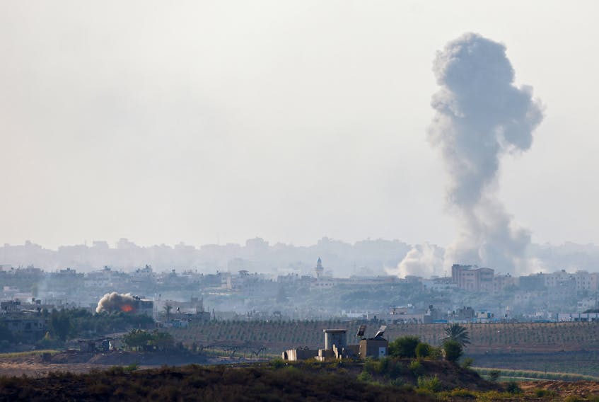 Smoke billows after rockets were launched from the Gaza Strip to Israel, as seen from Israel, October 30, 2023.