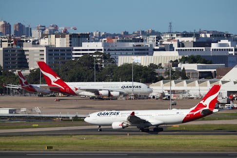 Qantas planes are seen at Kingsford Smith International Airport in Sydney, Australia, March 18, 2020. 