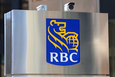Security cameras point towards pedestrians outside the Royal Bank of Canada (RBC) headquarters in Toronto, Ontario, Canada March 16, 2017. Picture taken March 16, 2017.  
