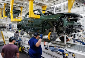 (Reuters) -Electric-vehicle maker Rivian Automotive on Wednesday forecast quarterly revenues to rise due to an increase in deliveries of its pickup trucks and sport utility vehicles. The Amazon-backed