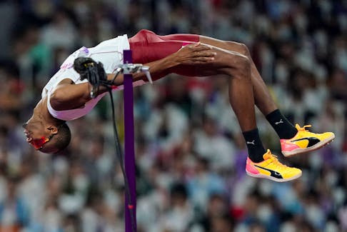 By Martin Quin Pollard HANGZHOU, China (Reuters) - Qatari high jumper Mutaz Barshim sailed to his third Asian Games title on Wednesday, adding another medal to an impressive collection for the