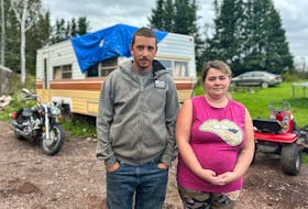 Cody Guthrie and Tiffany Mcmurrer stand in front of their family's camper. About five months ago, they were sleeping inside the vehicle when a car crashed onto the side of the camper. Thinh Nguyen • The Guardian