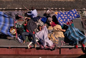 MEXICO CITY (Reuters) - The costs of spiking migration for a key Mexican border state due to a sharp downturn in U.S.-bound cargo trucks total nearly $1 billion over about two weeks, state officials