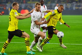 DORTMUND, Germany (Reuters) - AC Milan were frustrated by a disciplined Borussia Dortmund as their Group F fixture in the Champions League ended in a cagey 0-0 draw at Signal Iduna Park on Wednesday.