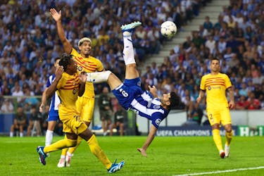 PORTO, Portugal (Reuters) - Substitute Ferran Torres scored to give Barcelona a hard-fought 1-0 win at Porto in their Champions League Group H clash on Wednesday, with the Spanish side finishing with