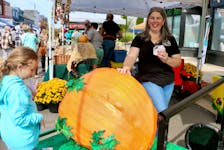 Jo Gould-Thorpe, co-owner of Cherry Tree Distillery in Windsor, was volunteering her time during the Windsor Garlic Festival to promote a new pumpkin-related activity being planned for next fall.