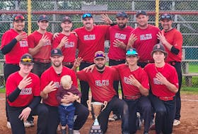 Brookfield Elks signal a fourth straight Shooters Bar and Grill Fastpitch League championship. Front row, from left, Keegan Maguire, Jay Duffy, London Duffy (mascot), Coby Crowell, Cam Euloth and Will Singer. Second row, Levi Denny, Gerald Wall, Alex Rhoddy, Justin Schofield, Andy MacIsaac, Patrick Stewart, and Mike Wood. Missing from photo, Jeremy Locke, Jacob Bowers, Randall Bernard, and Kody Blois. Contributed